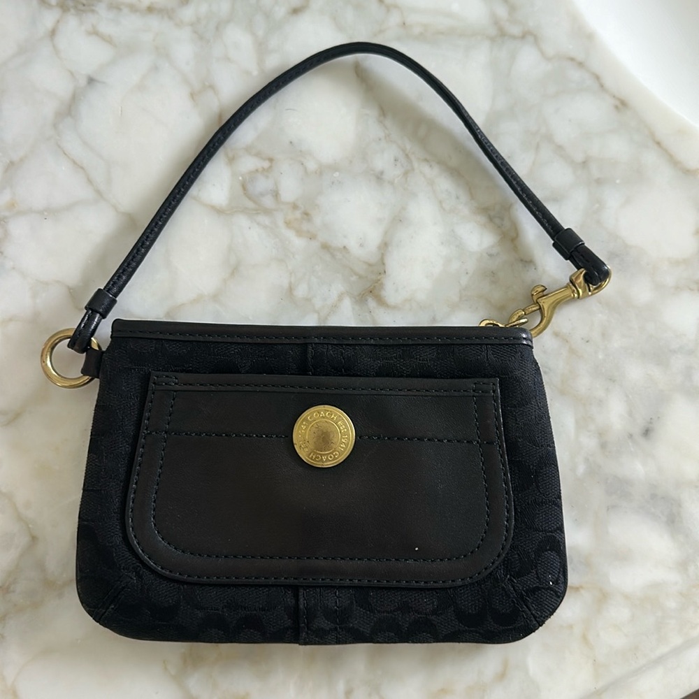 Coach black wristlet.